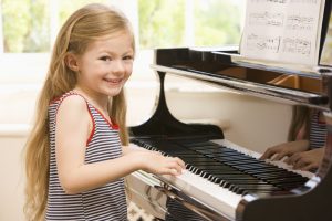 girl piano 300x200 Perfectionism or Excellence   Which One Will Best Build Your Online Business?